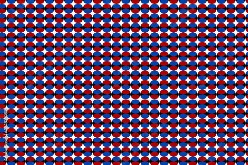 Patrón de esferas en colores rojo y azul sobre fondo blanco