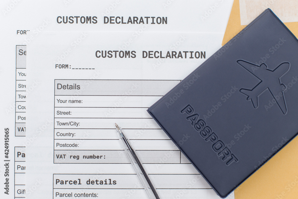 a Passport over Customs Declaration form. customs Agent concept. Planning a deal or shipping item parsel on post. - obrazy, fototapety, plakaty 