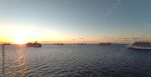 Sunset over the sea and carnival assemble