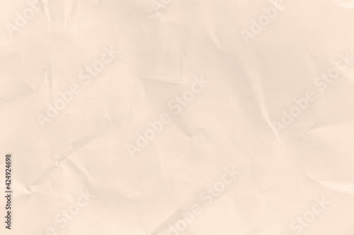 Recycled crumpled brown paper texture or paper background for design with copy space for text or image