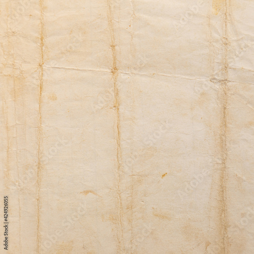 Recycled crumpled brown paper texture or paper background for design with copy space for text or image