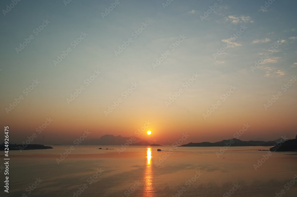 Sunrise over calm harbour