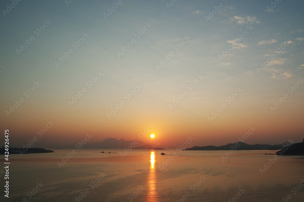 Obraz premium Sunrise over calm harbour