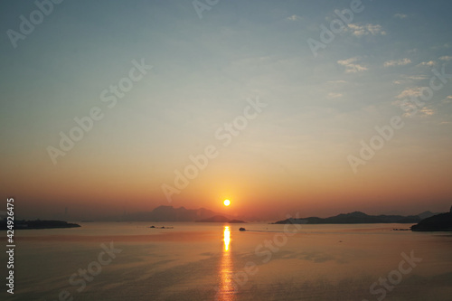 Sunrise over calm harbour