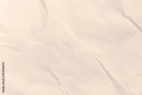 Recycled crumpled brown paper texture or paper background for design with copy space for text or image