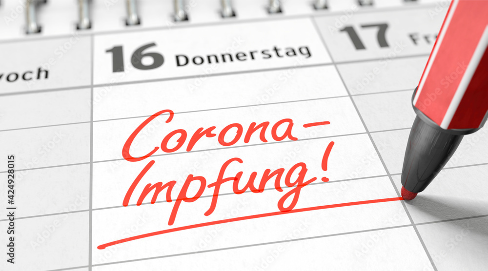 Impftermin für Corona-Impfung in den Kalender eintragen Stock Photo 