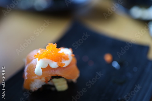 Overhead japanese sushi food. Top view of assorted sushi. Rainbow sushi roll.