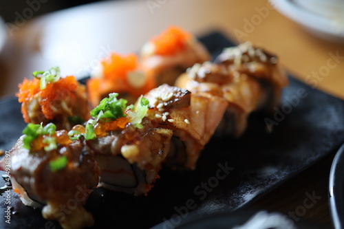 Overhead japanese sushi food. Top view of assorted sushi. Rainbow sushi roll.