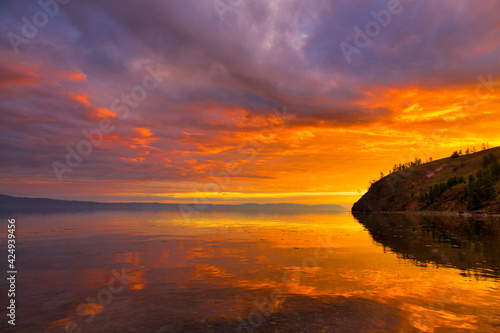 sunset over the lake © Евгений Кожевников