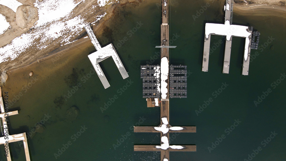 4K Aerial drone photo of snowy lake dock 4K Aerial drone photo of snowy lake dock