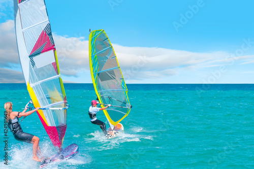 Windsurfer surfing the wind on waves in Cesme bay - Izmir, Turkey