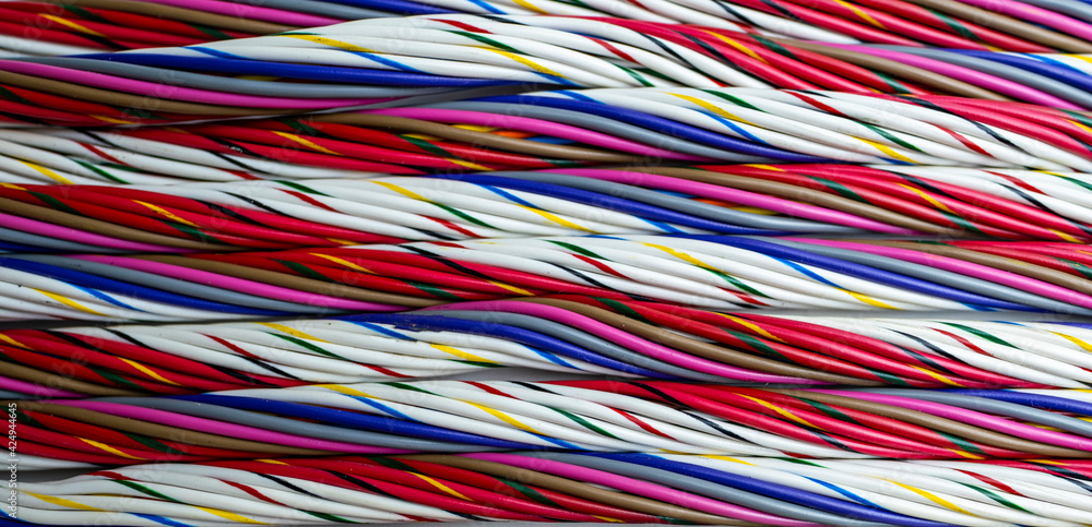 The texture of copper wires in multi-colored isolation.