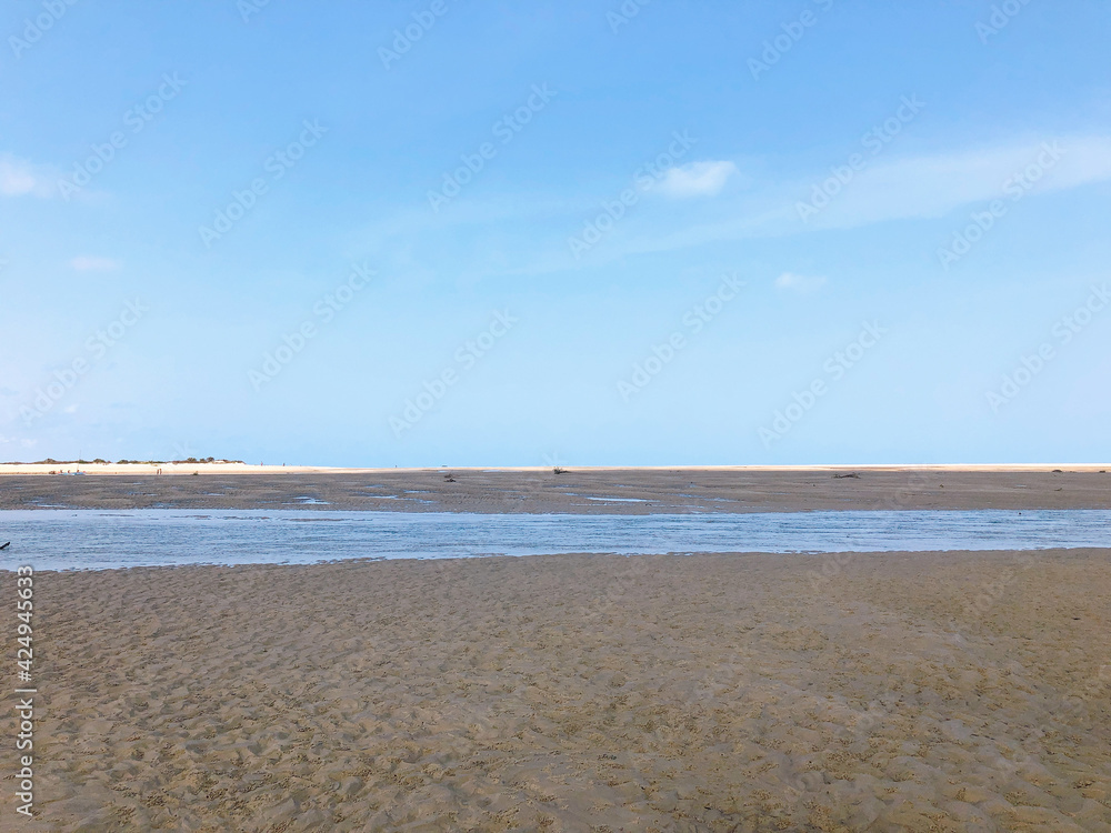 [Madagascar] Wet sandy beach after the tide and blue clear sky (Betania village, Morondava)
