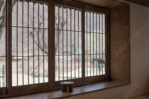 Korean traditional wooden tea table with wooden windows.