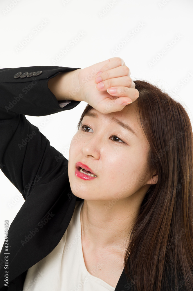 疲れた表情をする女性 疲れた表情をする女性