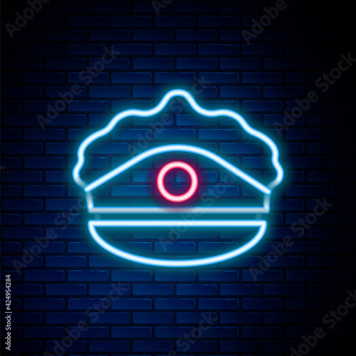 Glowing neon line Police cap with cockade icon isolated on brick wall background. Police hat sign. Colorful outline concept. Vector
