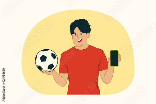Young man football fan hold mobile phone with blank empty screen concept