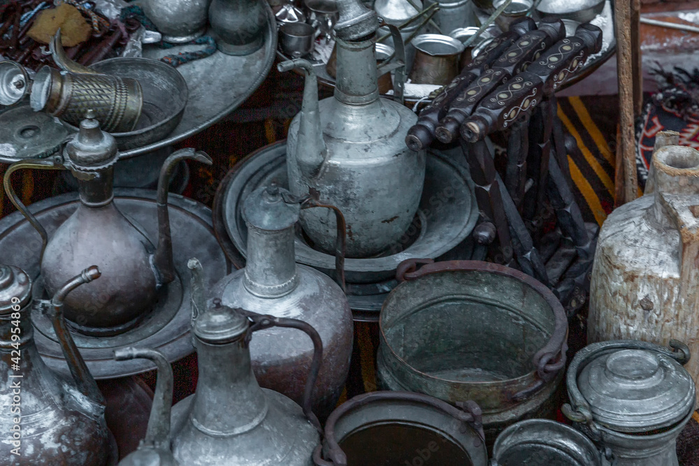 Old metal antique tableware on the market in Turkey. Old metal antique tableware on the market in Turkey.
