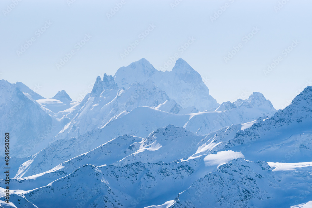 Snowy Caucasus mountains Ushba, Schelda, Kogutai in winter, view from Elbrus slope; Kabardino-Balkaria, Russia