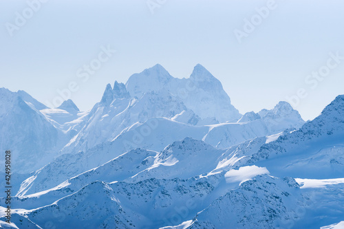 Snowy Caucasus mountains Ushba, Schelda, Kogutai in winter, view from Elbrus slope; Kabardino-Balkaria, Russia