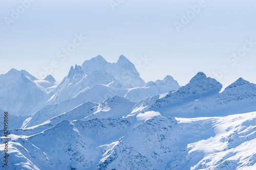 Snowy Caucasus mountains Ushba  Schelda  Kogutai in winter  view from Elbrus slope  Kabardino-Balkaria  Russia