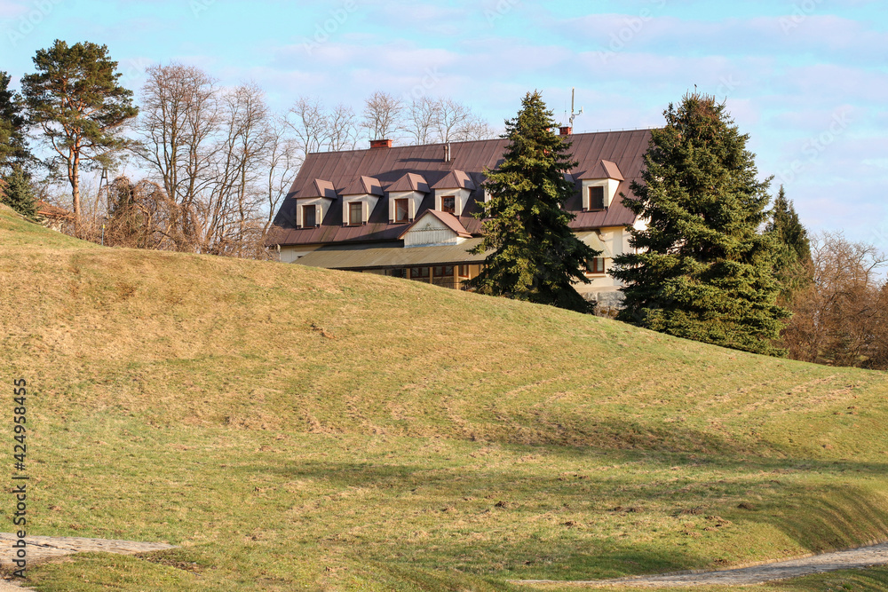 TROPIE, POLAND - MARCH 31, 2021: A church and hermitage TROPIE, POLAND - MARCH 31, 2021: A church and hermitage