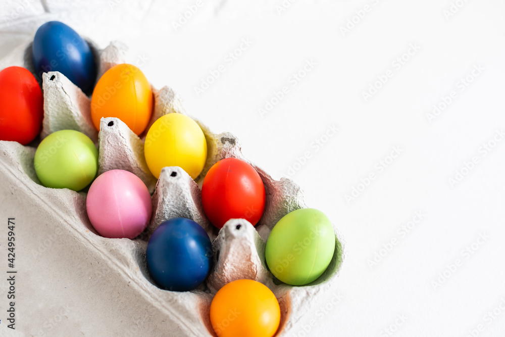 Obraz premium Colorful Easter Egg bottom border over a background. Copy space
