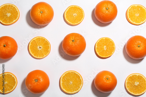 Flat lay composition with fresh ripe oranges on white background