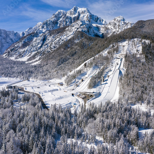 Aerial view of Ski Jump in Planica, Slovenia at Ratece near Kranjska gora in winter with snow. photo