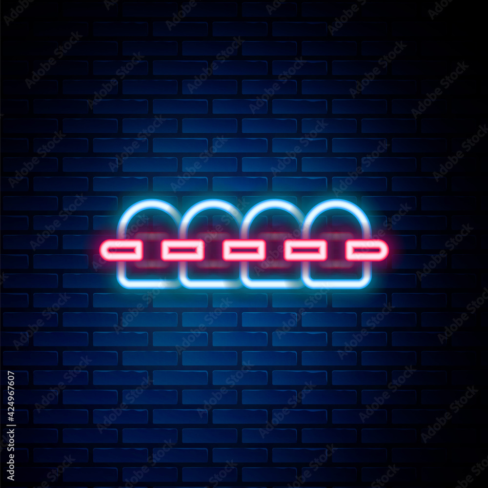 Fototapeta premium Glowing neon line Teeth with braces icon isolated on brick wall background. Alignment of bite of teeth, dental row with with braces. Dental concept. Colorful outline concept. Vector