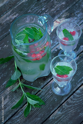 Photography a healthy natural drink based on birch kvass with the addition of berries and mint leaves