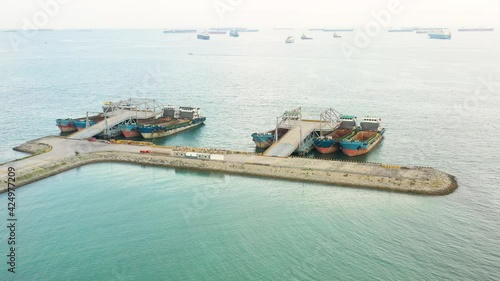 Drone shot of empty cargo ships moored, Singapore photo