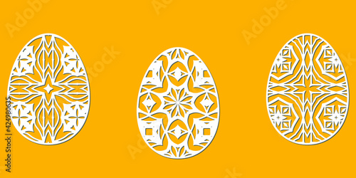 Eggs for Easter holidays - ornamental egg in paper art style. Set of decorative elements for cutting paper laser cutting and plotter