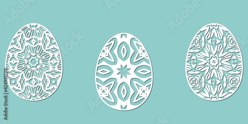 Eggs for Easter holidays - ornamental egg in paper art style. Set of decorative elements for cutting paper laser cutting and plotter