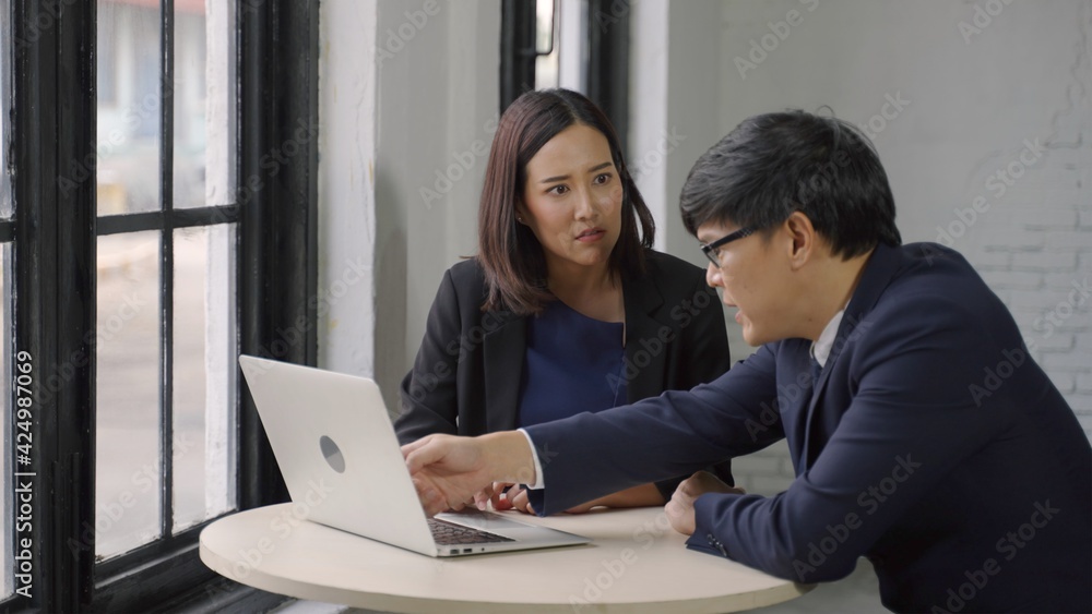 Man and woman arguing disagreeing about bad business contract, colleagues having conflict dispute about document sitting at office desk, partners shouting breaking agreement with unacceptable terms Man and woman arguing disagreeing about bad business contract, colleagues having conflict dispute about document sitting at office desk, partners shouting breaking agreement with unacceptable terms