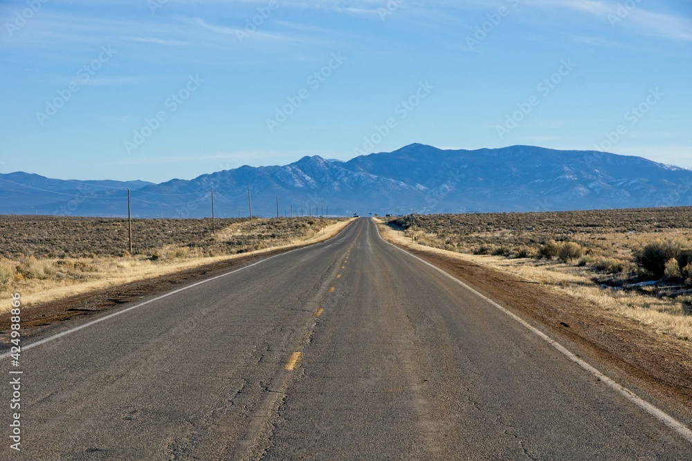 Empty road near Taos New Mexico Empty road near Taos New Mexico