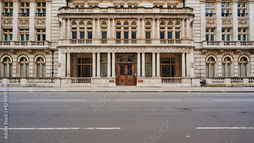 Symmetric view Old 19th century building in london on empty road and no sky and no people