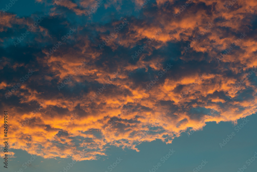 Beautiful sky landscape with yellow clouds at sunset