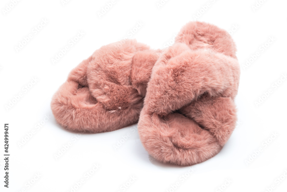pink fluffy home women slippers supply isolated onn white background . pink fluffy home women slippers supply isolated onn white background .