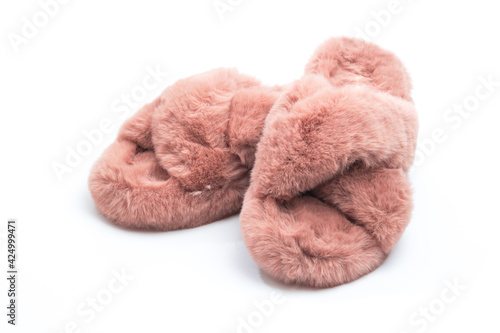 pink fluffy home women slippers supply isolated onn white background .