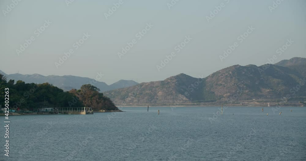 Sea ocean and mountain in sunny bay Sea ocean and mountain in sunny bay