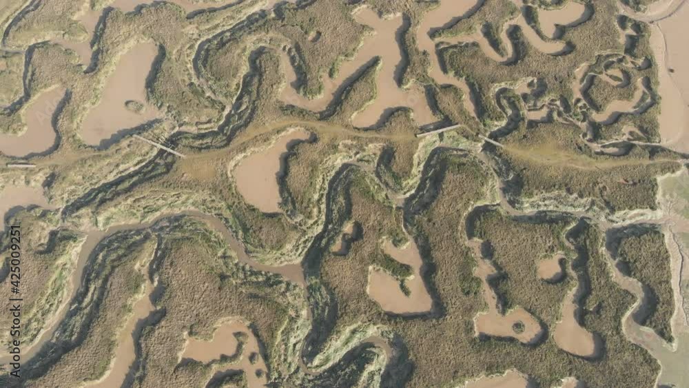 Top down descending view of Tollesbury marshes Top down descending view of Tollesbury marshes