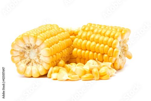 Pieces of Fresh organic corn cob and seeds isolated on white background