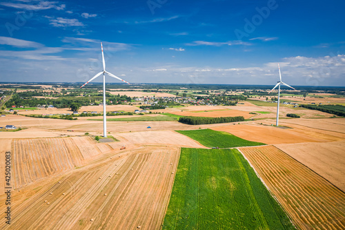 Wind turbine on field durin...