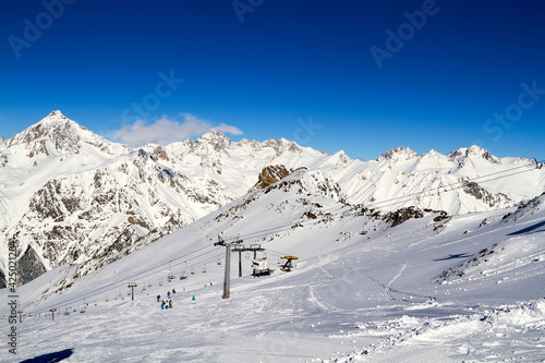 Beautiful snowy mountains and blue sky Dombay Karachay-Cherkessia © Elena Petrovich
