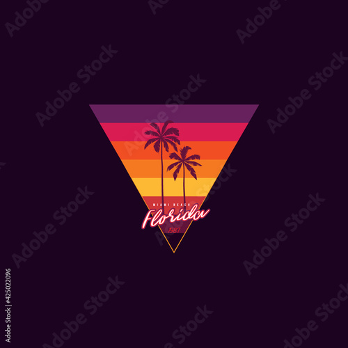 Original vector retro print of a palm tree on the background of a triangular sunset. T-shirt design.
