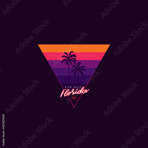 Original vector retro print of a palm tree on the background of a triangular sunset. T-shirt design.