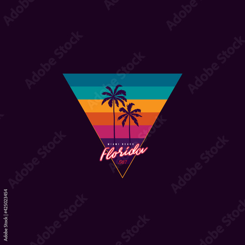 Original vector retro print of a palm tree on the background of a triangular sunset. T-shirt design.
