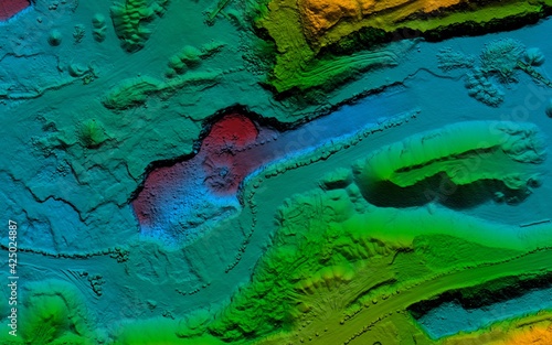 Model of a mine elevation. GIS product made after processing aerial pictures taken from a drone. It shows excavation site with steep rock walls