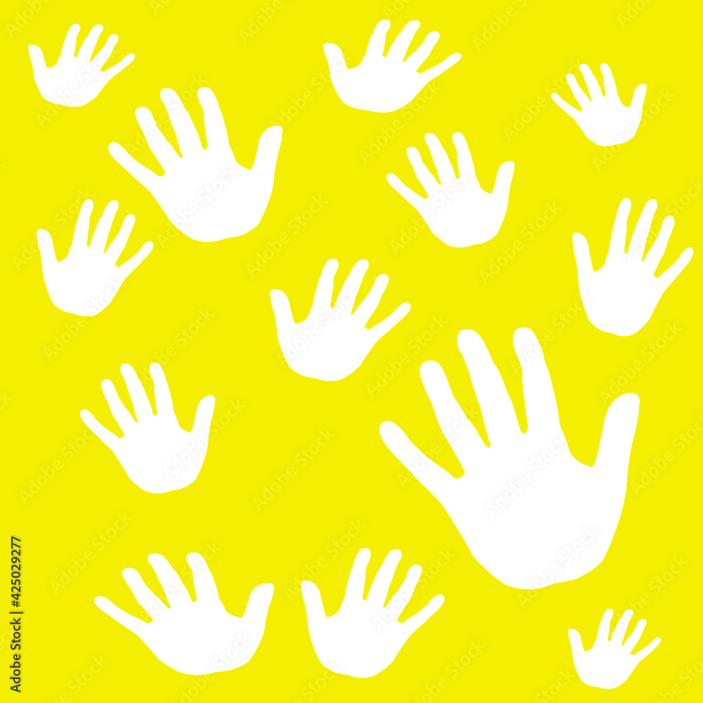 Fototapeta premium white hands on a yellow background